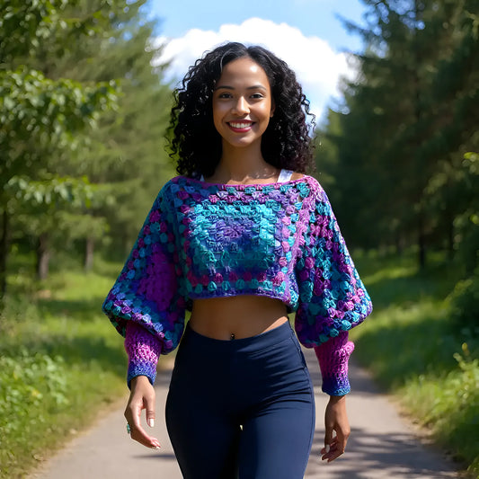 Pull au crochet Blue Lagoon de Cachalabibi - turquoise - vue de face montrant les motifs géométriques carrés concentriques